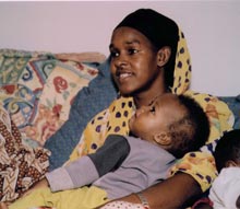 Bantu girl holding a child