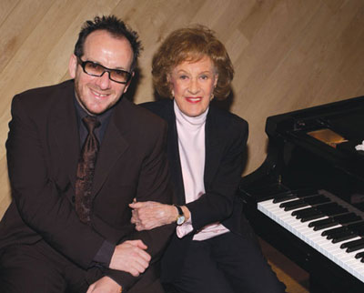 Photograph of Marian McPartland with Elvis Costello